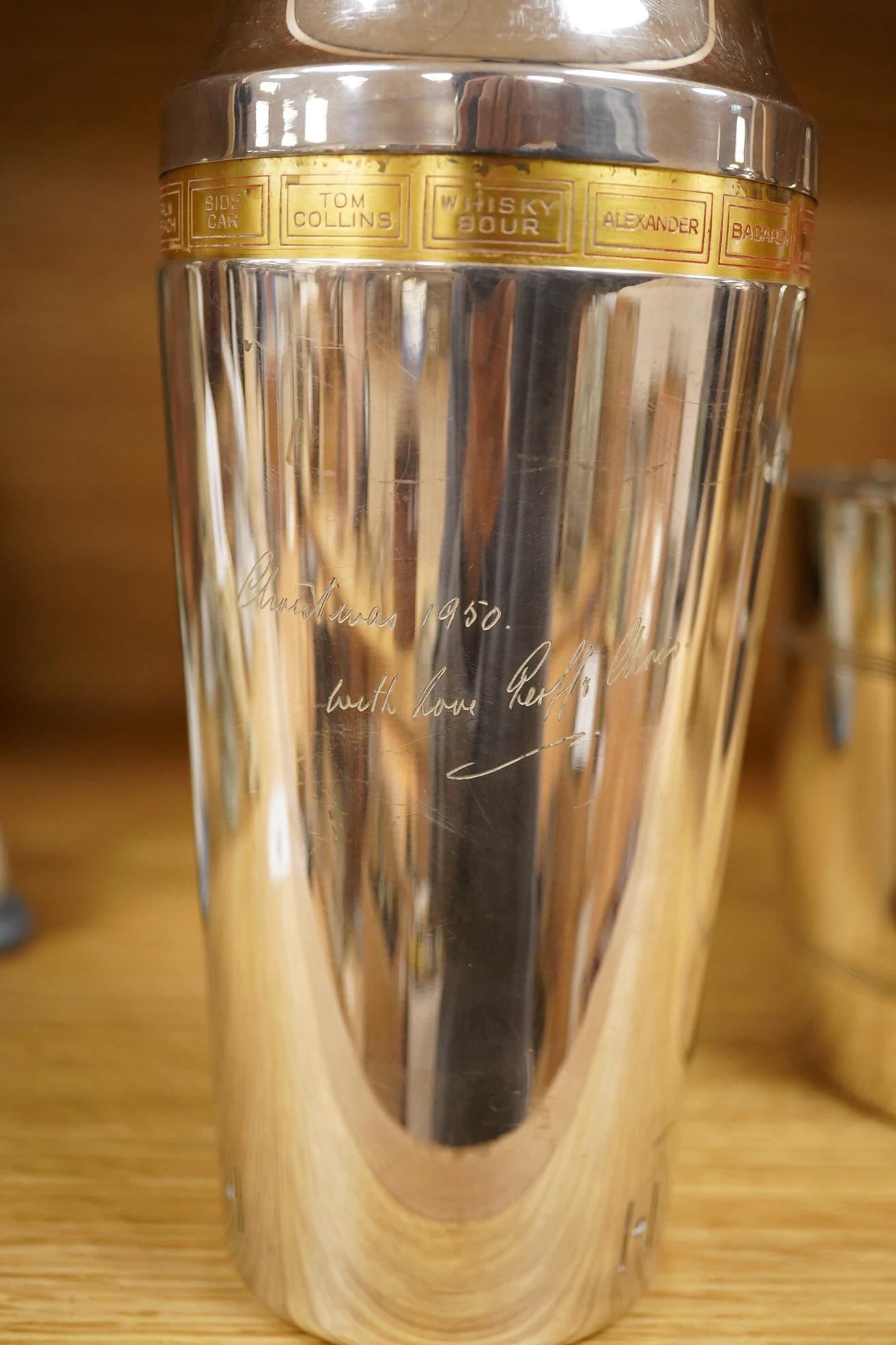 A mid 20th century silver plated patent cocktail shaker with recipes, two other cocktail shakers and an ice bucket, largest 28cm high